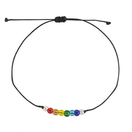 Detailed view of the rainbow bead bracelet on its black cord, showing the adjustable sliding knot closure.
