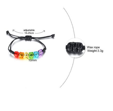 Detailed view of the rainbow bead bracelet showing the adjustable black wax rope closure.