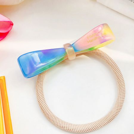 Plastic Acetic Acid Acetate Bowknot Hair Ponytail Bands (5 pcs) - A colorful rainbow-patterned acetate bowknot hair tie, part of a set of handmade ponytail bands.
