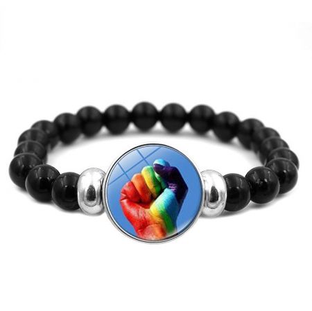 Detailed view of the Rainbow LGBT bracelet with a raised fist charm.