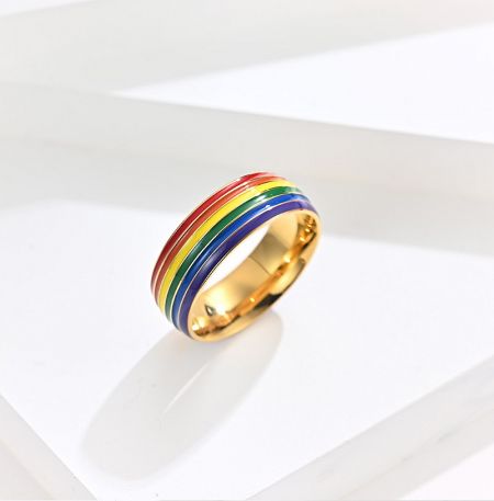 A close-up view of the Rainbow Enamel Ring with a polished gold finish.