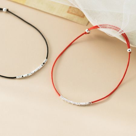 925 Silver Wholesale Minimalist String Bracelet Red and Black Adjustable Set of 5 - A pair of minimalist string bracelets, one red and one black, each adorned with polished 925 sterling silver beads, showcasing the adjustable design.
