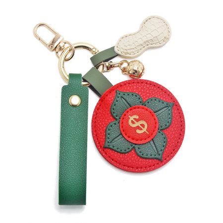 Good Things Ahead charm variant with a red persimmon and peanut PU leather design for good fortune.