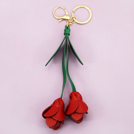 PU Leather Tulip Keychain Flower Bag Charm Gift for Women Wholesale (5 pcs) - Vibrant red PU leather tulip flower keychain with green stems and a polished gold-tone clip, designed as a stylish bag charm.