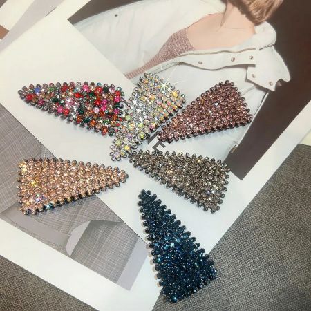 Six rhinestone-encrusted triangular hair clips in various vibrant colors.
