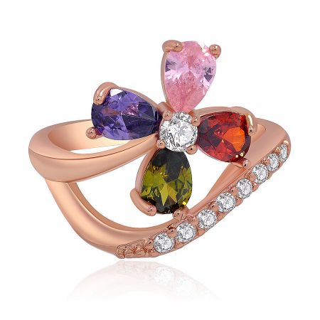 Flower Rose Gold Waves Ring - A close-up of the Flower Rose Gold Waves Ring, showcasing its intricate bow design with multicolored cubic zirconia stones set in rose gold plating.