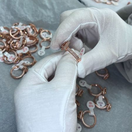 Final quality inspection of rose gold diamond rings