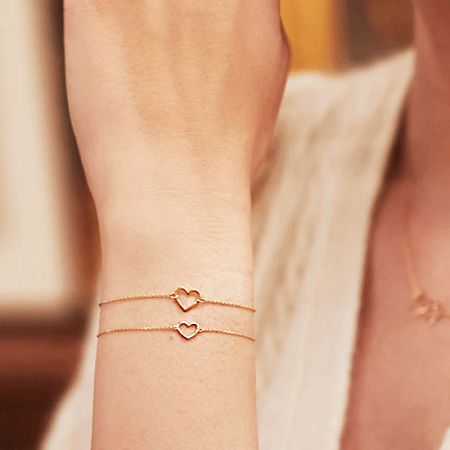 Elegant rose gold version of the hollow heart charm bracelet.