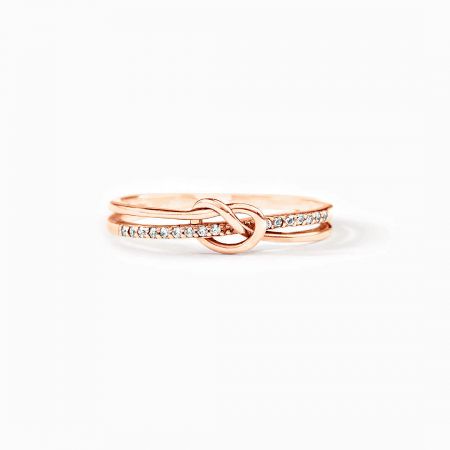Elegant rose gold version of the Eternal Bond knot ring, featuring a knot design and zircon stones.