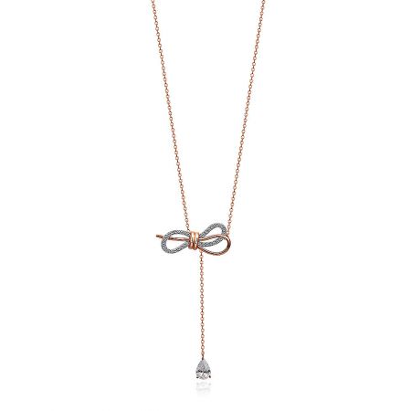 Tied Ribbon Bow Dangle Necklace - A stunning Tied Ribbon Bow Dangle Necklace in two-tone rose gold and rhodium, featuring a pave-set cubic zirconia bow and a dangling teardrop crystal.