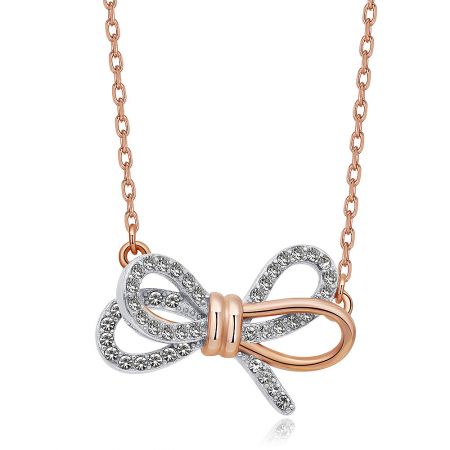 The Tied Ribbon Bow Necklace displayed on a white background, highlighting its elegant rose gold chain and gemstone bow pendant.