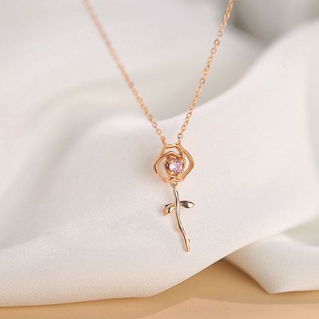 925 Silver Pink Zircon Rose Flower Pendant Necklace - A close-up of the 925 sterling silver rose flower pendant necklace in a rose gold finish, highlighting the central pink zircon stone.