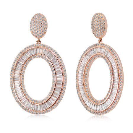 Side profile of the rose gold oval earrings, highlighting the intricate setting of the baguette stones.