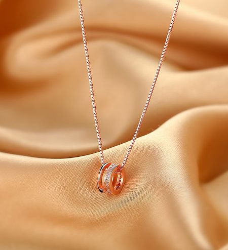 925 Sterling Silver Rose Gold Plated Geometric Round Circle Necklace - A close-up of the 925 Sterling Silver Rose Gold Plated Geometric Round Circle Necklace, showcasing its delicate pendant and sparkling cubic zirconia.