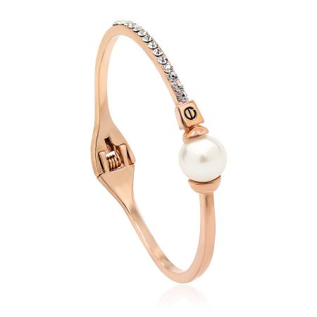 Side view of the rose gold pearl bangle, highlighting the large white pearl and embedded clear gemstones.