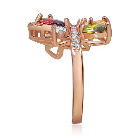 Side profile of the rose gold ring highlighting the setting of the red, white, and yellow-green stones.