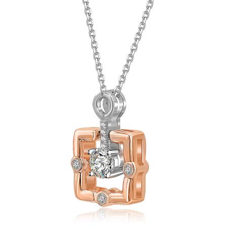 Angled shot of the rose gold and silver pendant necklace, highlighting its geometric design and sparkle.