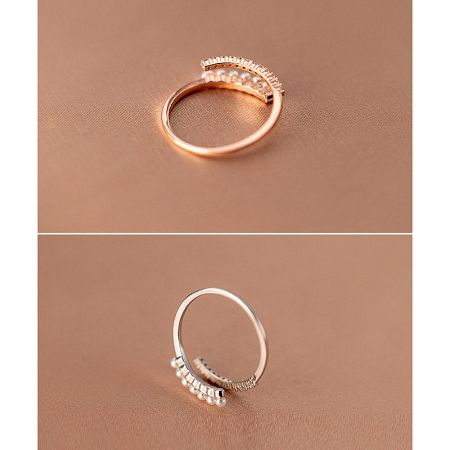 A side-by-side comparison of the rose gold and silver rings, displaying both color options available in the set.