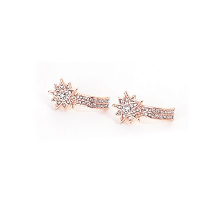Another angle of the star-shaped earrings, showing the brilliance of the clear gemstones.