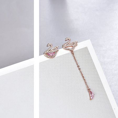 Elegant rose gold swan-shaped earrings with delicate pink and clear gemstones.