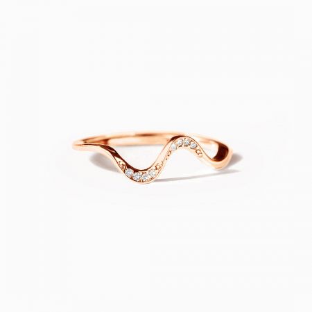 Elegant rose-gold plated Rhythmic Dance ring, displaying its warm tone and sparkling zircon accents.