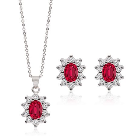 Full view of the rhodium-plated red gemstone sunburst necklace and earring set on a white background.