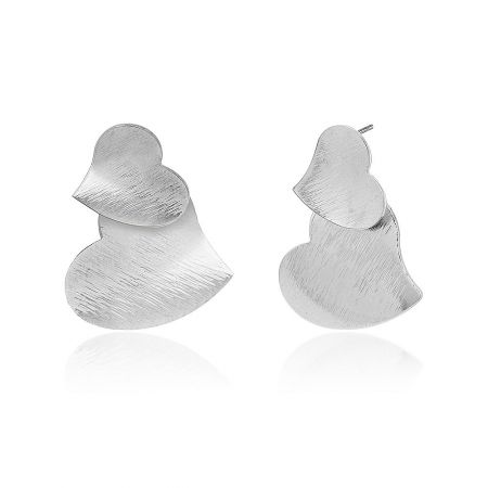 Close-up detail of the brushed rhodium plating on the Double Heart Stud Earrings.