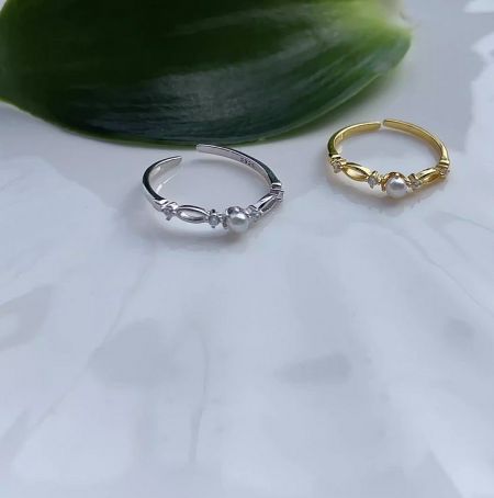 925 Sterling Silver Adjustable Pearl Ring - Elegant 925 sterling silver adjustable pearl rings, available in both silver and gold finishes, adorned with a central freshwater pearl and cubic zirconia accents.
