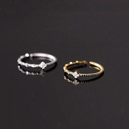 Minimalist 925 Sterling Silver Adjustable Ring Set (Set of 5) - A set of two minimalist adjustable rings in 925 sterling silver and gold-plated finishes, each featuring a delicate twist design and sparkling cubic zirconia stones.