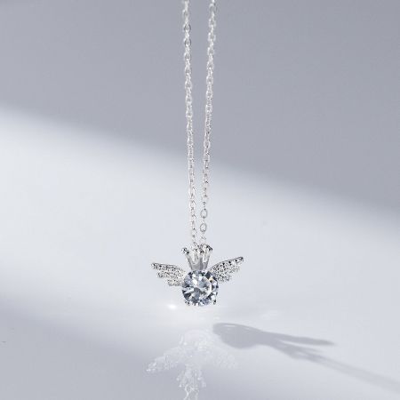 925 Sterling Silver Crown-Wing Pendant Necklace Set of 5 - A detailed view of a 925 sterling silver crown-wing pendant necklace, showcasing its intricate angel wing design and sparkling clear gemstone.