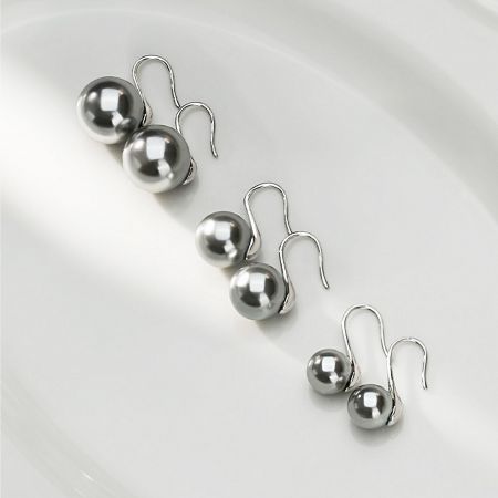 Three pairs of the 925 sterling silver pearl earrings with silver French hooks.