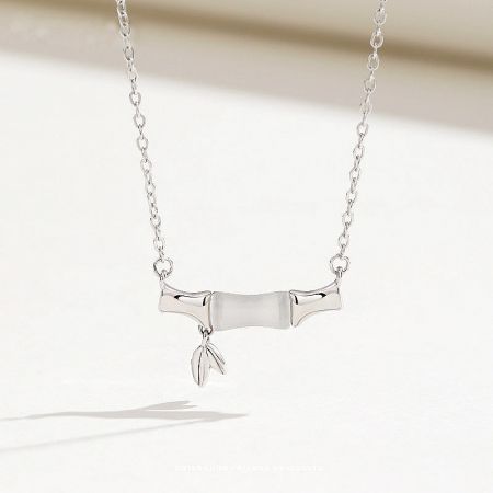 925 Sterling Silver White Opal Stone Bamboo Design Pendant Necklaces (Set of 5) - A close-up of a 925 sterling silver necklace from the set, featuring an elegant bamboo-inspired pendant with a white opal stone.