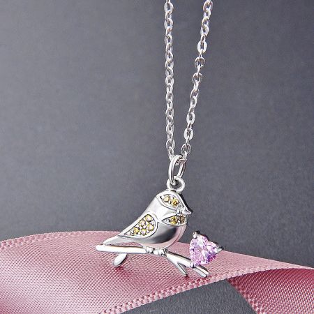 925 Sterling Silver Pink Heart Zircon Sparrow Bird Pendant Choker Necklaces (Set of 5) - Close-up of a 925 sterling silver sparrow bird pendant necklace, detailed with a pink heart zircon and yellow gemstone accents.
