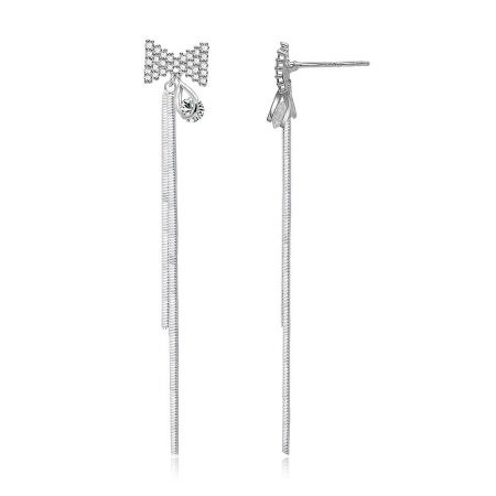 Detailed view of the bow-shaped top with cubic zirconia stones and a teardrop accent on the Bow Long Snake Chain Drop Earrings.