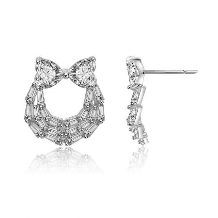 Angled view of the Two Hearts And Baguette Earrings, highlighting the layered, curved pattern of baguette-cut clear gemstones.
