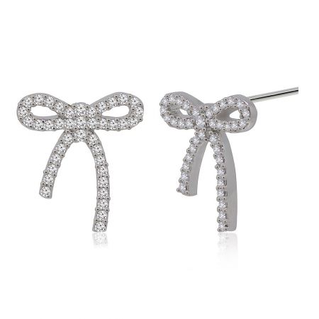 A pair of silver bow tie stud earrings, one showing the post for attachment, highlighting the craftsmanship.