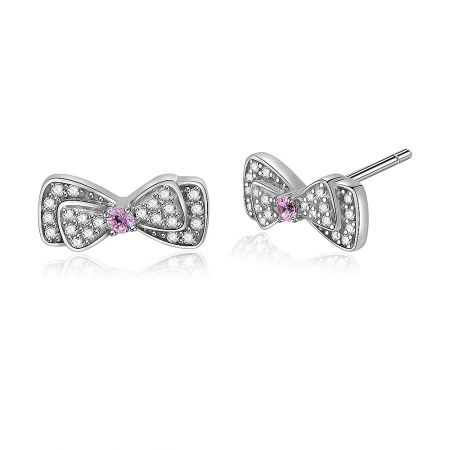 Angled shot of the mini silver bow stud earrings, highlighting the oxidized silver finish and the sparkle of the gemstones.