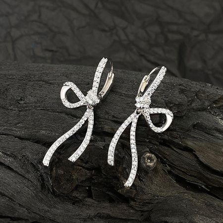 925 Sterling Silver Sweet CZ Bow Knot Pierced Earrings (5 Pairs) - A pair of 925 sterling silver sweet CZ bow knot pierced earrings, showcasing the intricate design and sparkling white stones on a neutral background.