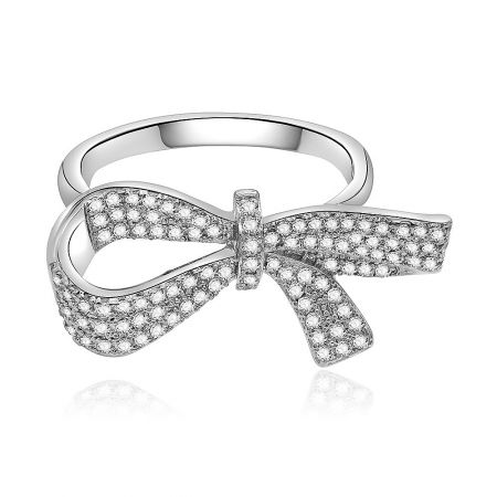 Large Charming Bow Ring - Front view of the Large Charming Bow Ring, showcasing its intricate bow design crafted from rhodium-plated brass and pave-set with sparkling cubic zirconia stones.