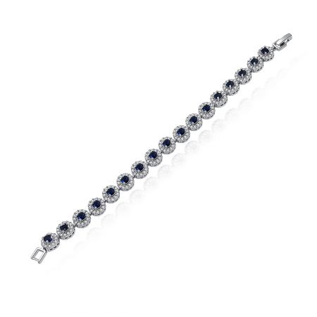 A full view of the elegant Sapphire Elegance Bracelet laid out, highlighting its repeating pattern of sapphire-like gemstones.