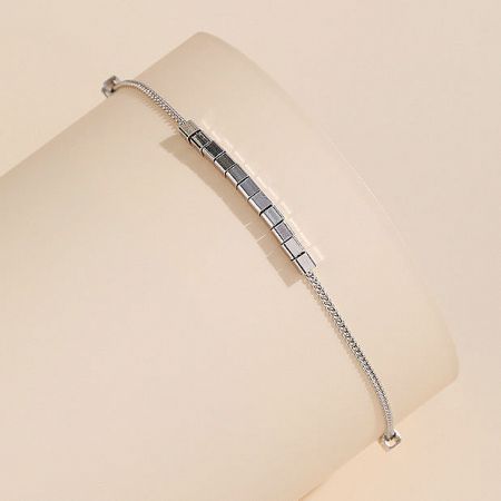 A stylish silver bracelet combining classic chain links with modern rectangular links.