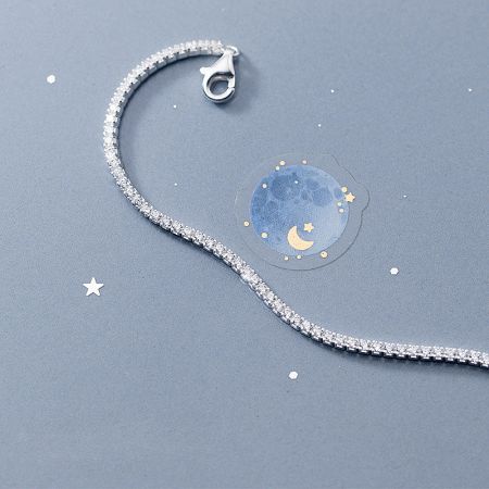 Detailed view of the sterling silver tennis bracelet highlighting the brilliant cubic zirconia stones.