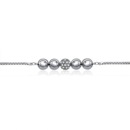 Angled shot of the silver charm bracelet, focusing on the decorative central ball paved with sparkling cubic zirconia.