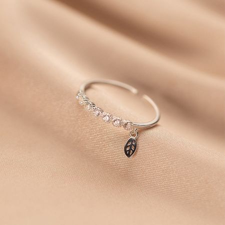 925 Sterling Silver Adjustable Ring with Cubic Zirconia Leaf Pendant Set of 5 - A close-up of a 925 sterling silver adjustable ring from a set of five, featuring an elegant leaf design and a sparkling dangling cubic zirconia charm.