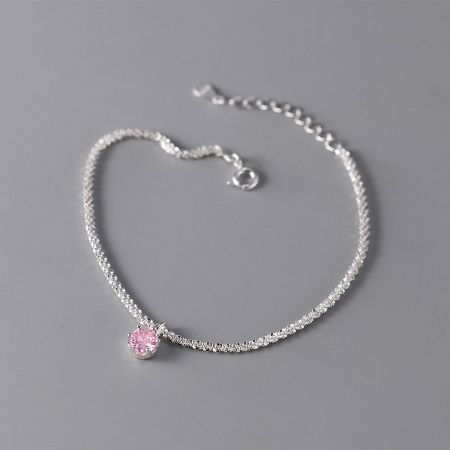 Detailed view of the 925 silver bracelet with a delicate pink zircon stone.