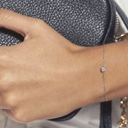 Model's wrist adorned with the elegant 925 sterling silver thin chain bracelet.