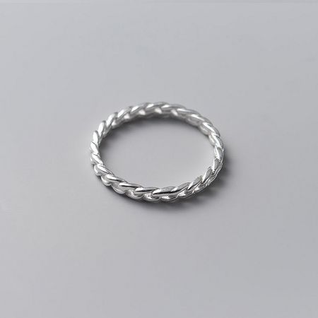 Side view of the braided sterling silver ring, highlighting its fine craftsmanship.