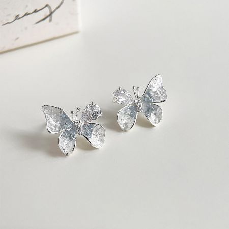 Another angle of the silver butterfly earrings, showing the beautiful light reflection on the crystal wings.