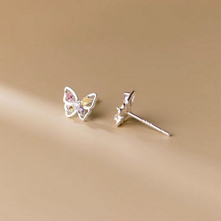 Full set of five pairs of sterling silver butterfly earrings with cubic zirconia.