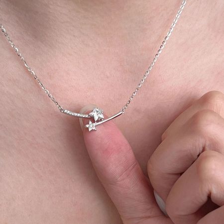 Detailed view of a platinum-plated 925 sterling silver butterfly pendant necklace from the celestial set.